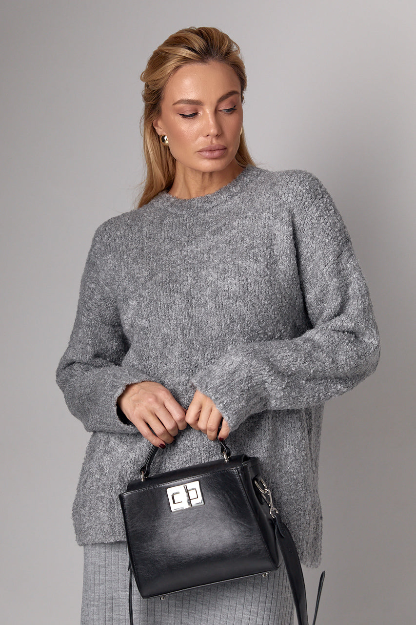 féminin подовжений в'яenаний джемпер oversize